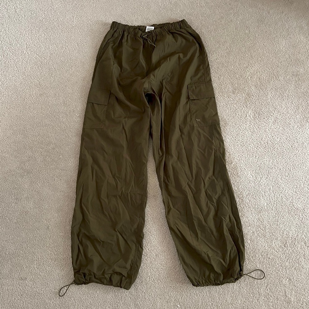 Dark green parachute pants